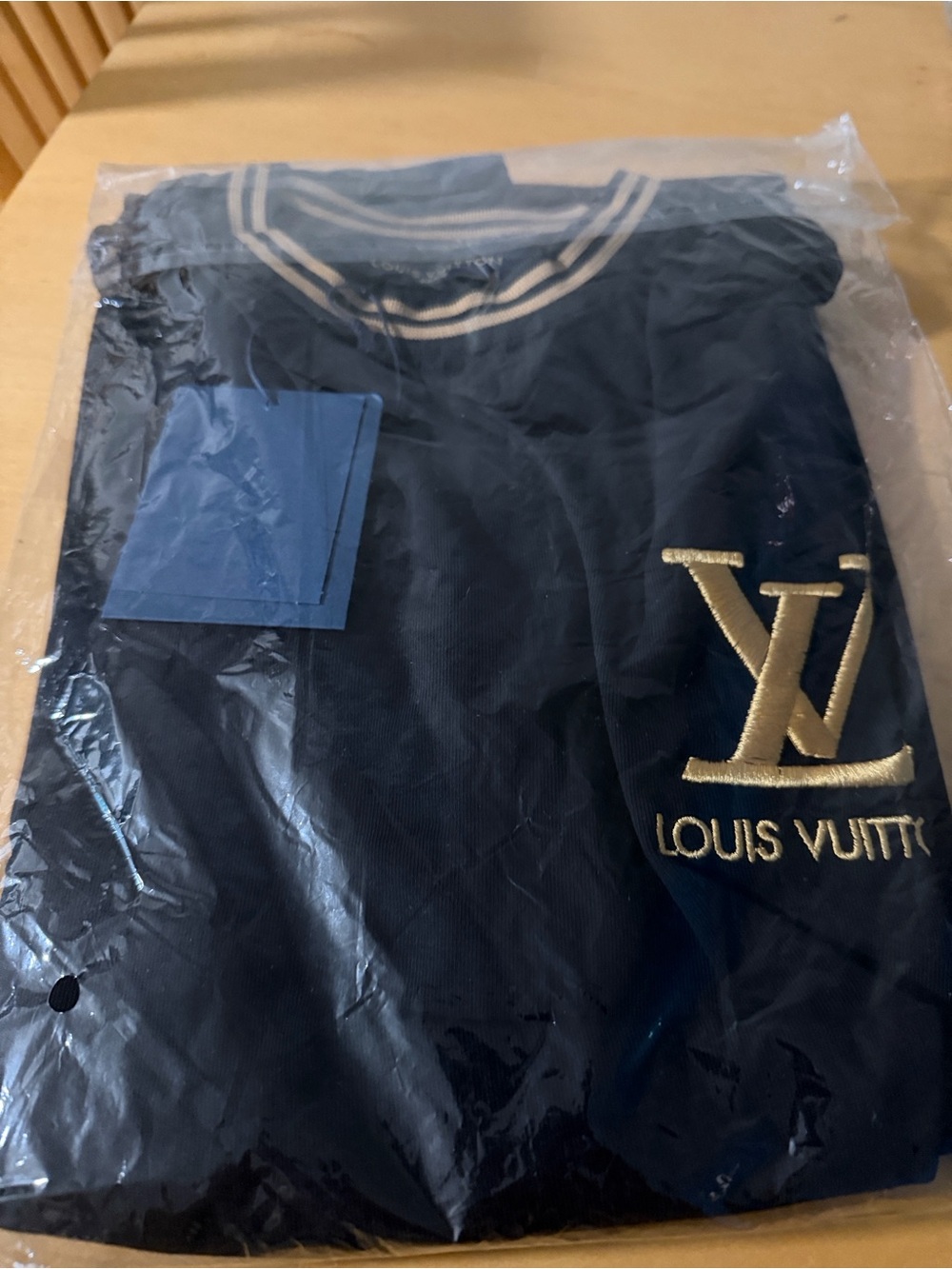 Louis Vuitton Black T-Shirt with Gold LV Logo and Striped Trim - Picture 3 of 4